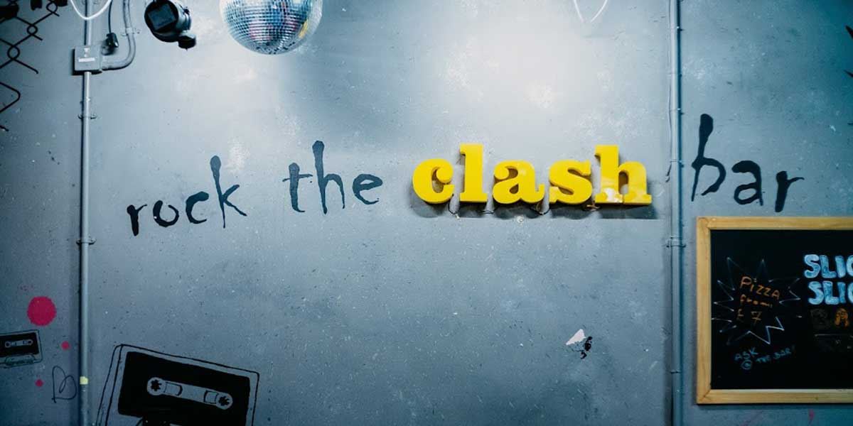 rockin' the Clash Bar signage at Clink 78 hostel in London