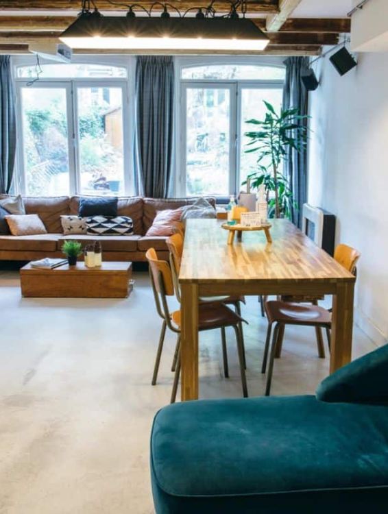 couches and social space at clinkcoco hostel in amsterdam