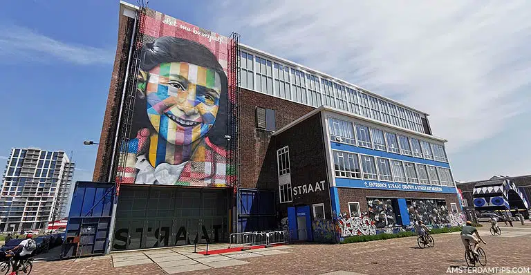 Outdoor artwork mural of Anne Frank in Amsterdam 
