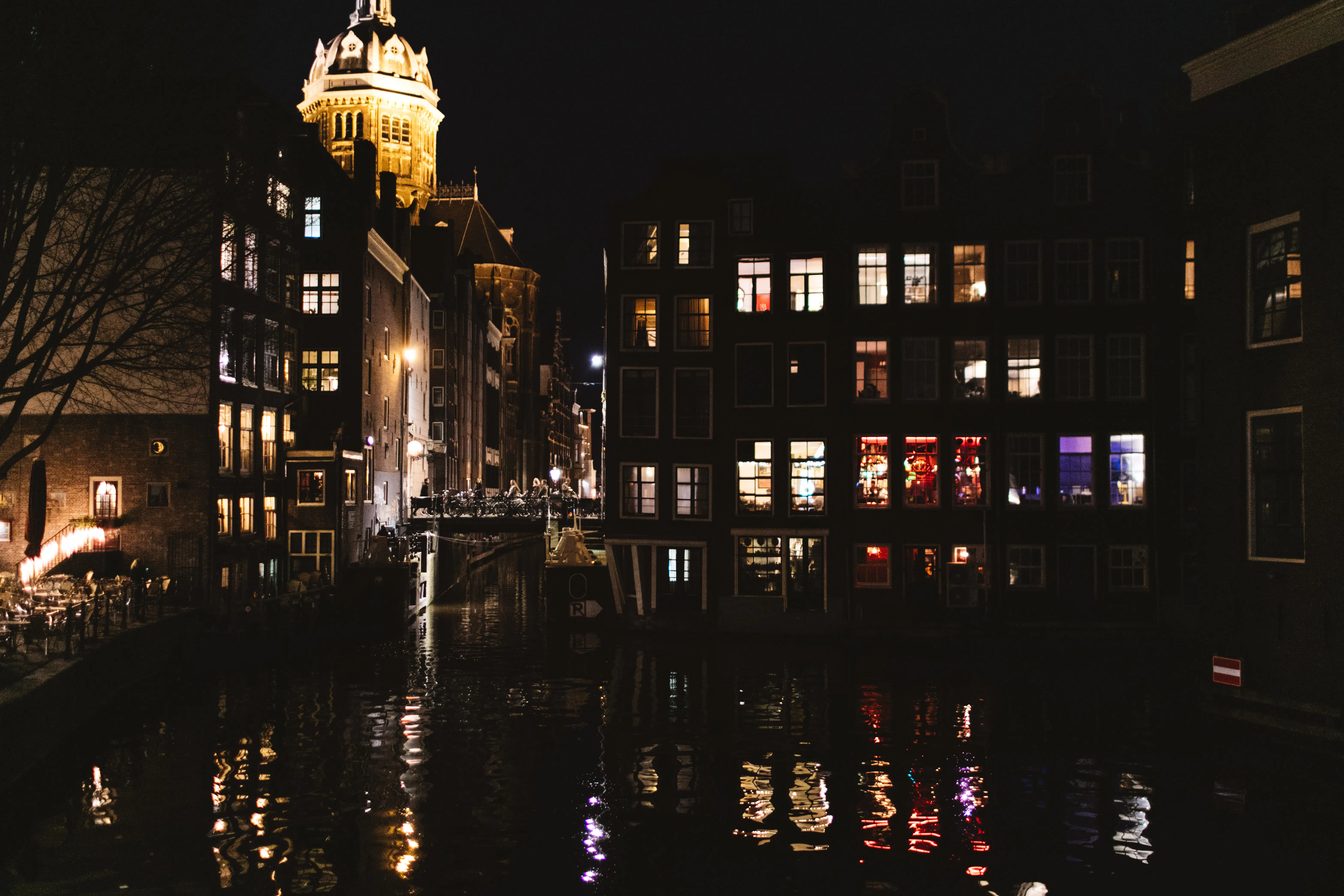 night time lights by one of Amsterdam's many canals