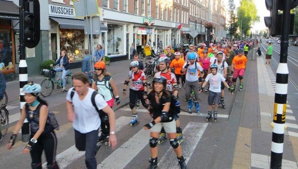 People roller skating on Amsterdam streets