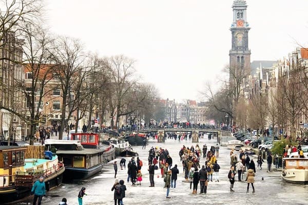 Amsterdam frozen canal in winter