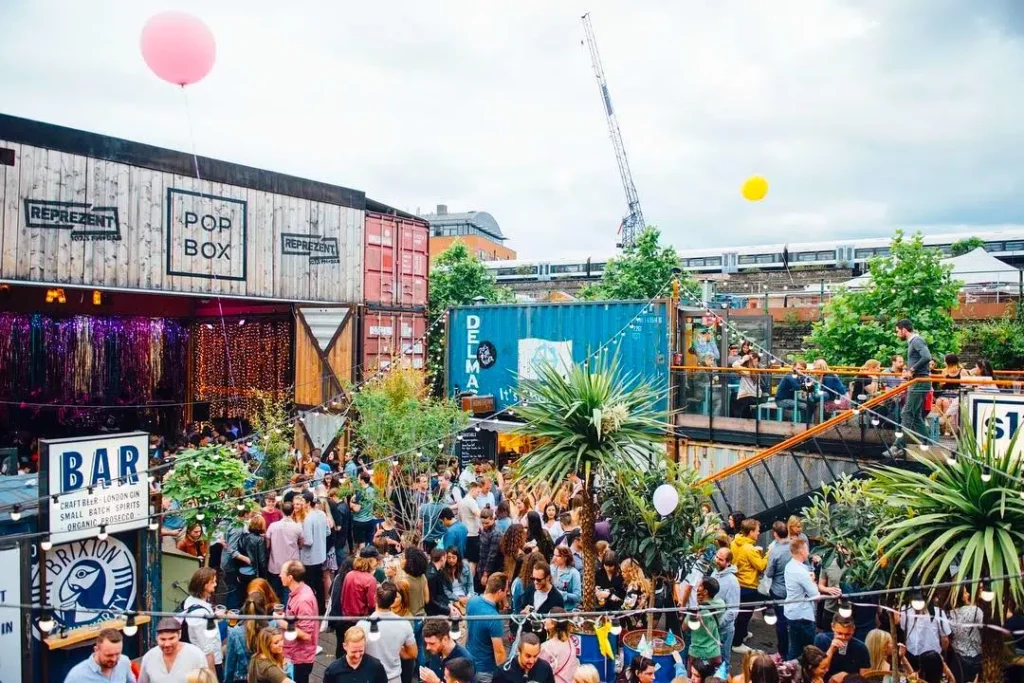People partying outside at Pop Brixton