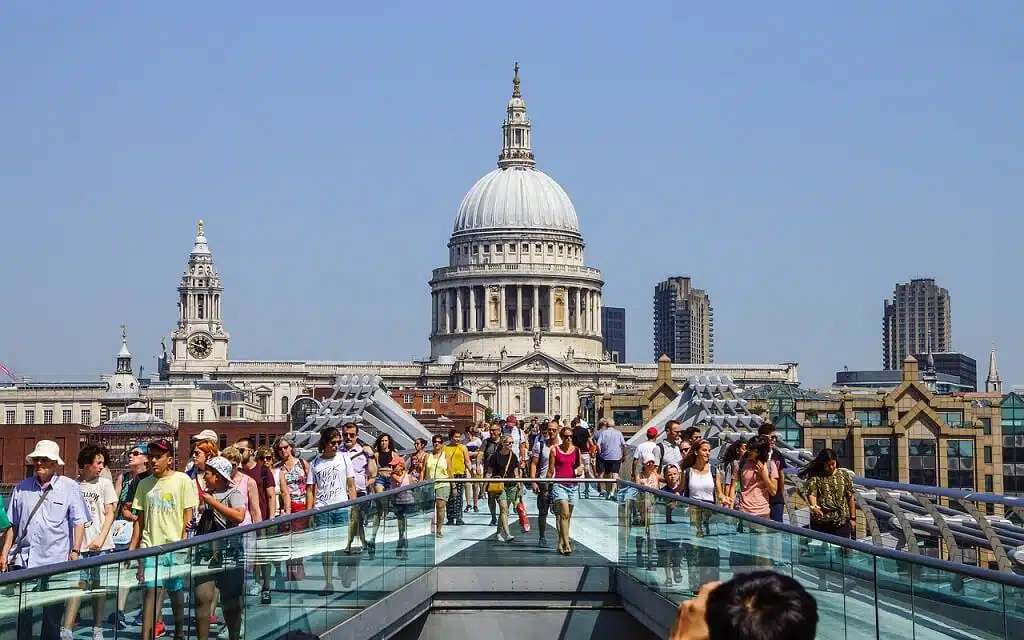 People walking in London with St Paul's Cathedral in the background