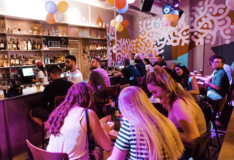 Groups gather at Zincbar in ClinkNOORD hostel in Amsterdam