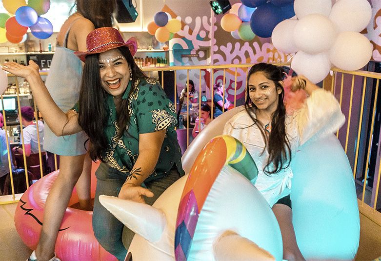 Guests at ClinkNOORD hostel in Amsterdam join the fun and celebrate at a Pride Party